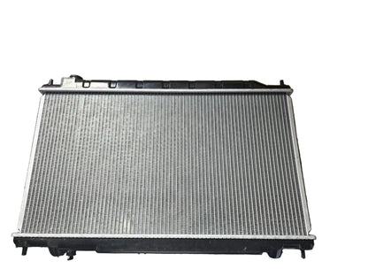 Kra10192 Car radiator on a metal surface with cardboard boxes in the background