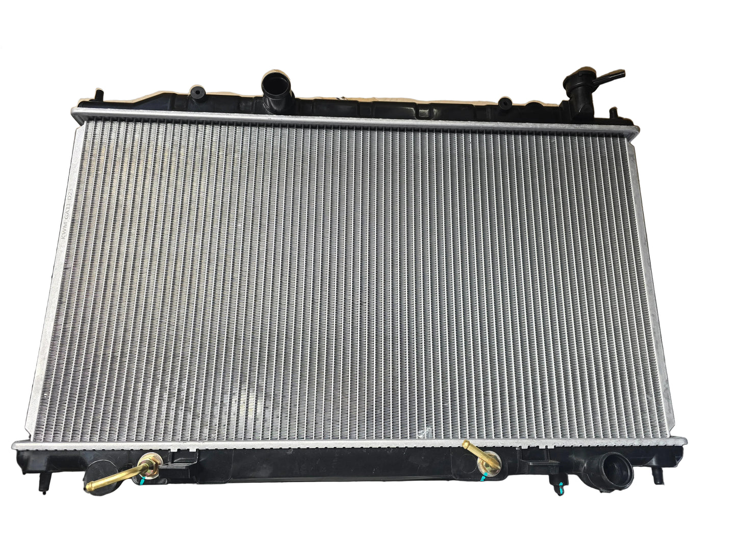 Kra10192 Car radiator on a black surface with cardboard box in the background