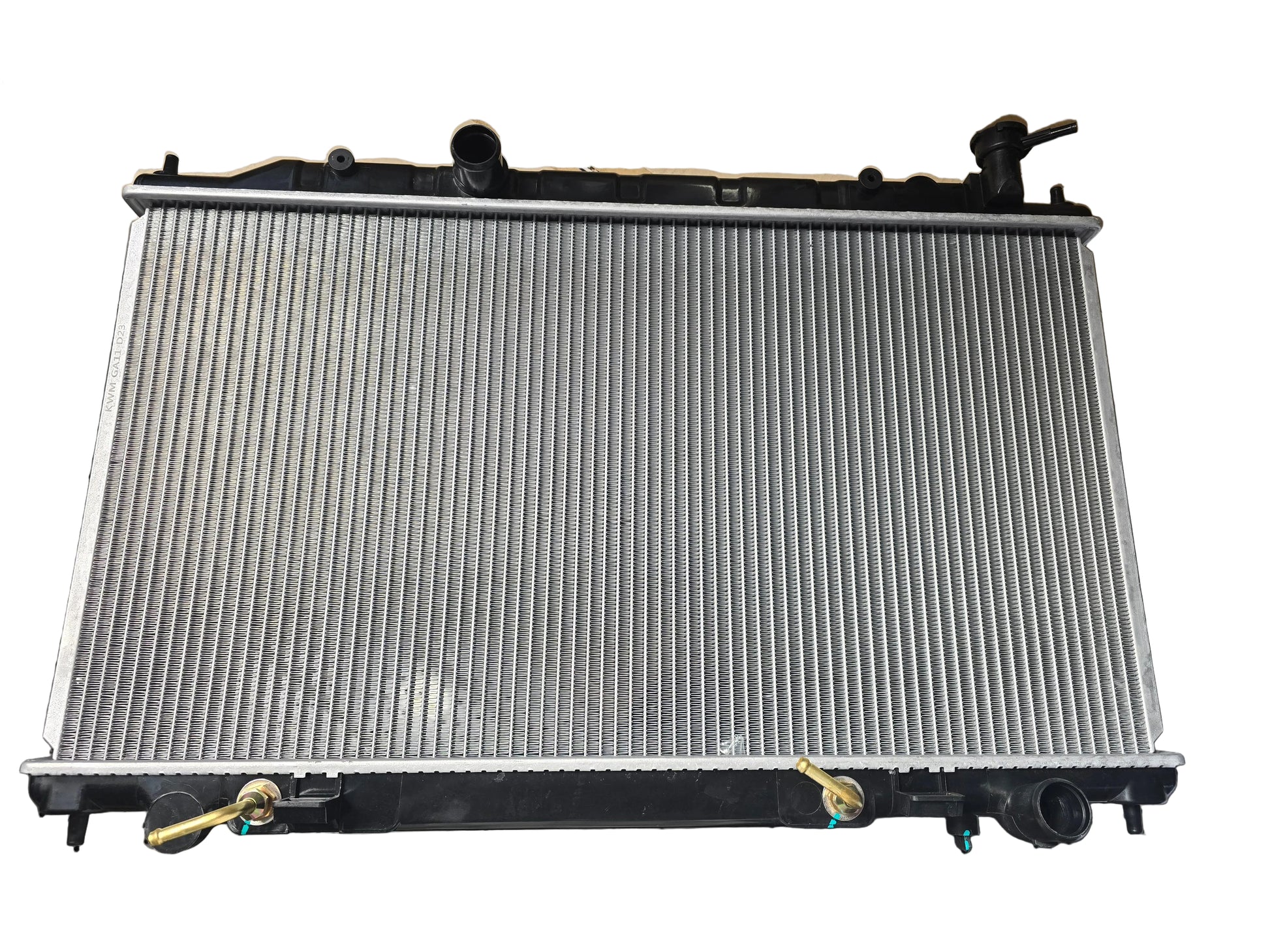 Kra10192 Car radiator on a black surface with cardboard box in the background